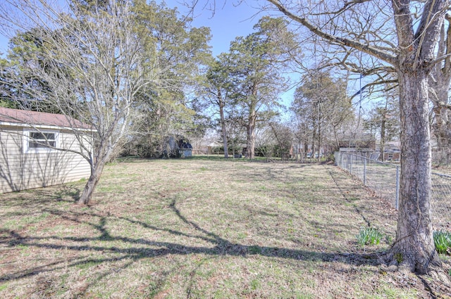 view of yard with fence