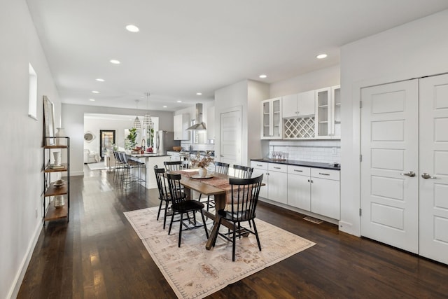 dining room featuring dark hardwood / wood-style floors