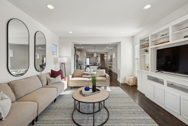 living room with dark wood-type flooring