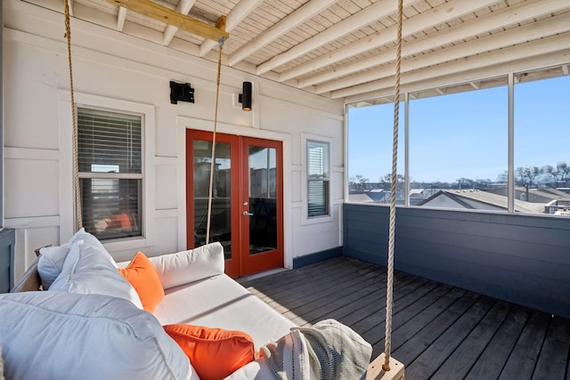 sunroom / solarium featuring beamed ceiling and wood ceiling