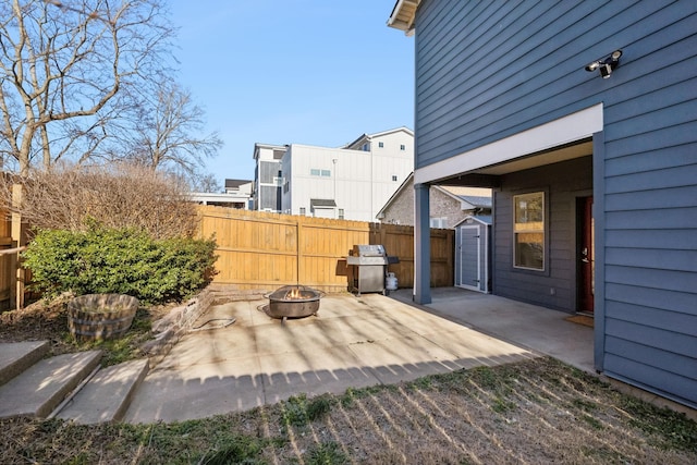 view of patio / terrace with area for grilling and an outdoor fire pit