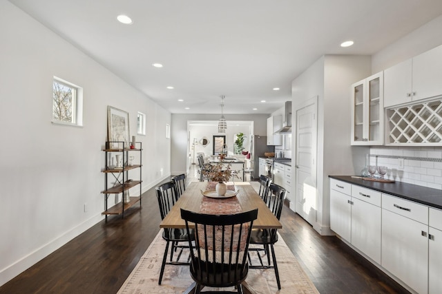 dining room featuring dark wood-type flooring