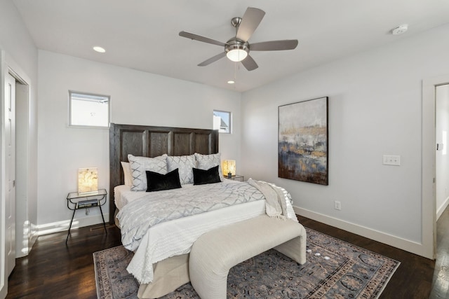 bedroom featuring ceiling fan and dark hardwood / wood-style flooring