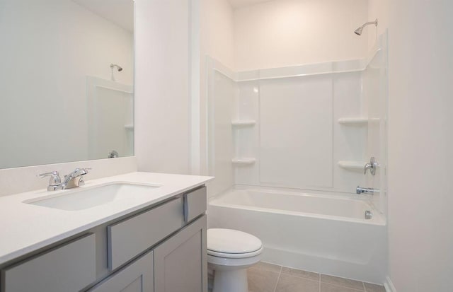 full bathroom featuring tile patterned floors, vanity, toilet, and tub / shower combination