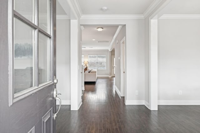 corridor featuring crown molding and dark hardwood / wood-style floors