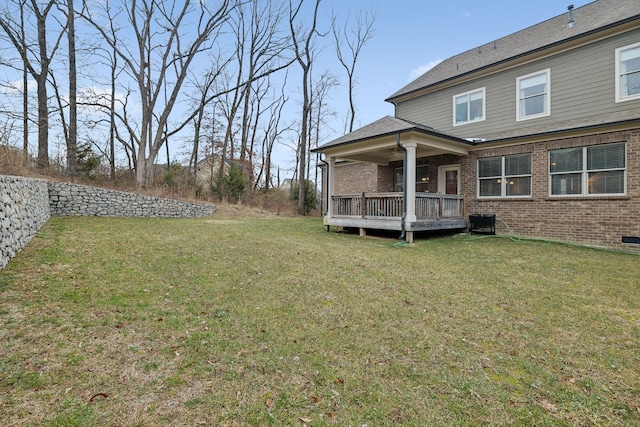 view of yard with a deck