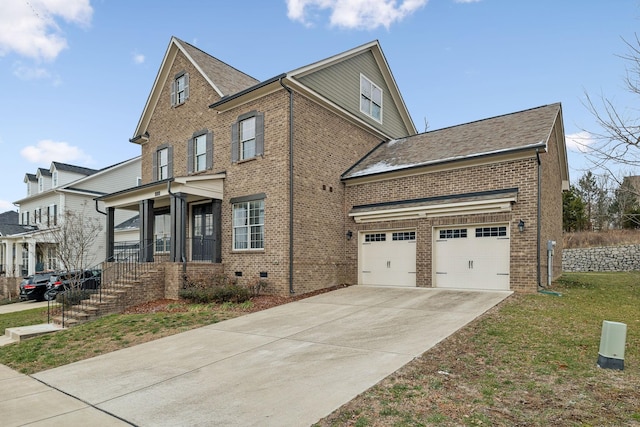 view of front facade featuring a front yard and a garage