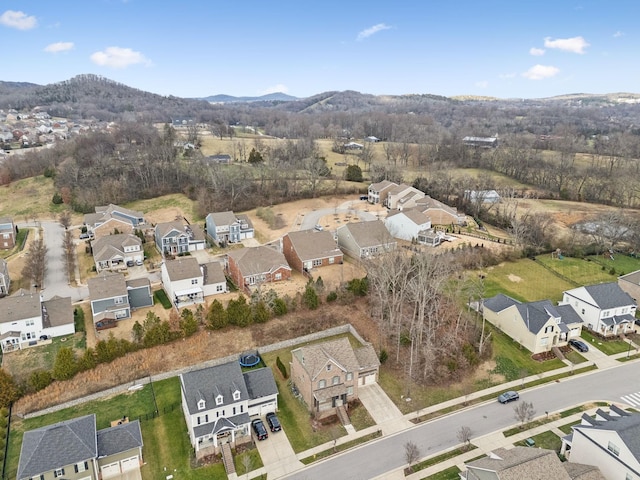 drone / aerial view featuring a mountain view