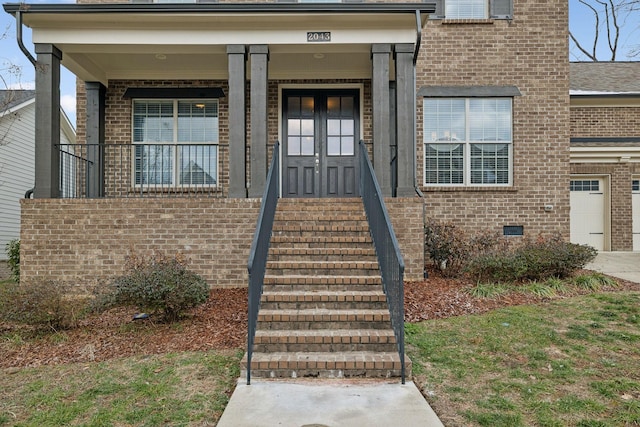 entrance to property with covered porch