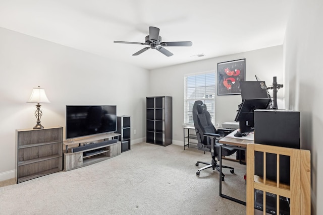 office area with ceiling fan and carpet floors