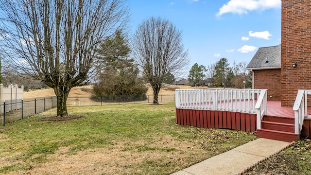 view of yard with a wooden deck