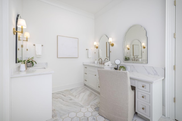 bathroom with vanity and ornamental molding