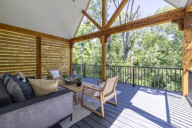 wooden terrace featuring outdoor lounge area