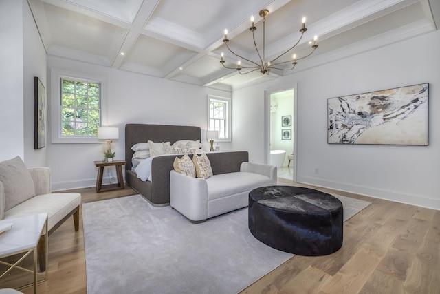 bedroom featuring coffered ceiling, beam ceiling, light wood-type flooring, and an inviting chandelier