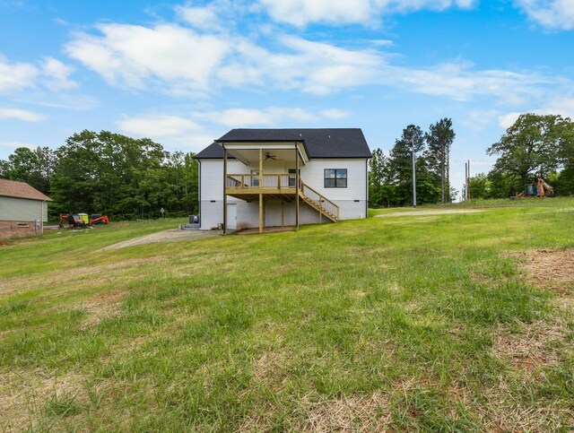 983 Palmyra Rd, Clarksville, TN 37040 - rear view of property with stairway, a lawn, ceiling fan, and a wooden deck