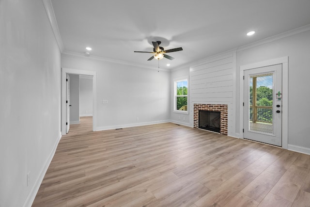 983 Palmyra Rd, Clarksville, TN 37040 - unfurnished living room with crown molding, a ceiling fan, recessed lighting, light wood-style floors, and baseboards