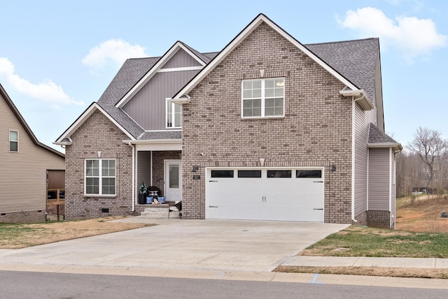 view of front of property with a garage