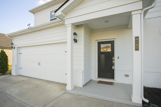 property entrance featuring a garage