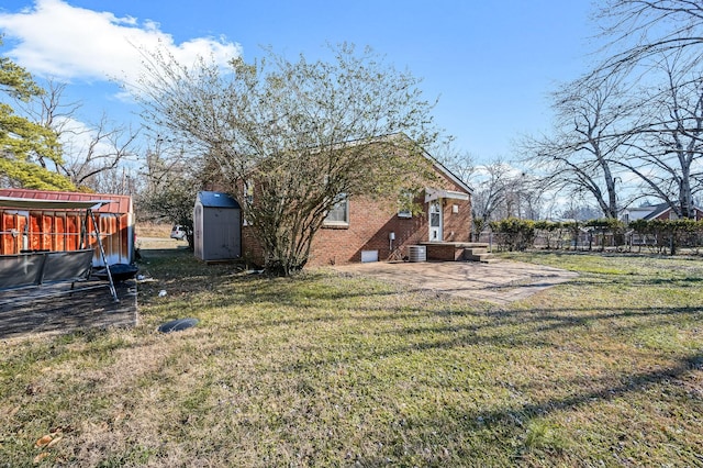 view of yard with central AC unit and a storage unit