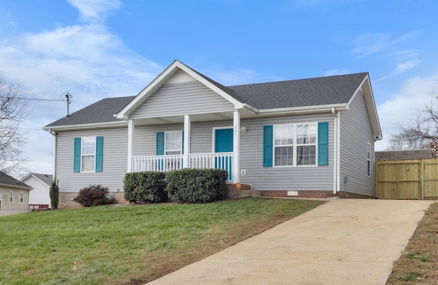 view of front of property with a porch and a front lawn