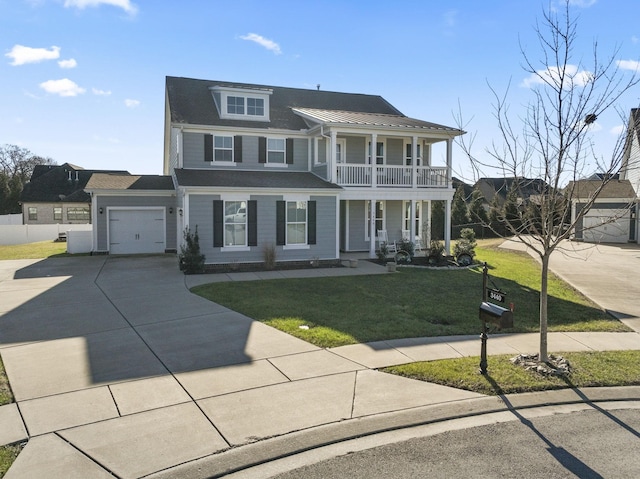 view of front of home with a garage, a porch, a balcony, and a front lawn