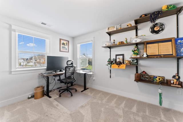 view of carpeted office space