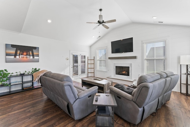 living room with french doors, ceiling fan, dark hardwood / wood-style flooring, and lofted ceiling