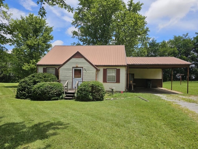 view of front facade featuring a carport and a front yard