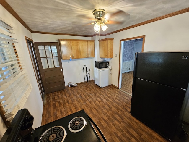 kitchen with dark hardwood / wood-style floors, ceiling fan, ornamental molding, and black appliances