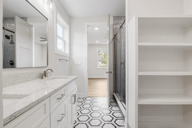 bathroom featuring vanity and walk in shower