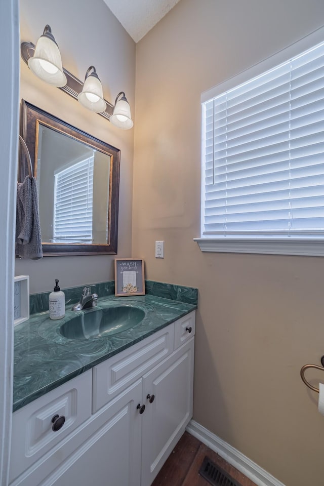 bathroom featuring vanity