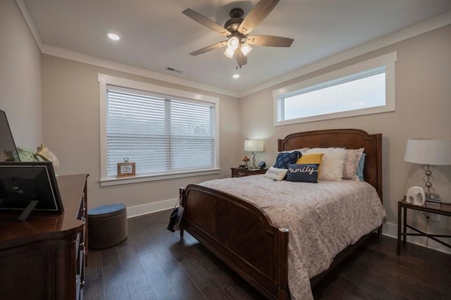 bedroom featuring visible vents, crown molding, ceiling fan, baseboards, and dark wood-style floors