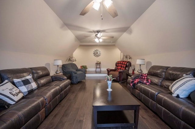 living area featuring dark wood-type flooring, vaulted ceiling, and ceiling fan