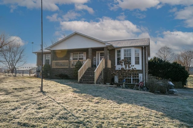 view of front of property featuring covered porch