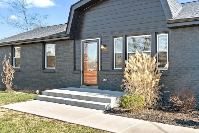 entrance to property featuring a patio