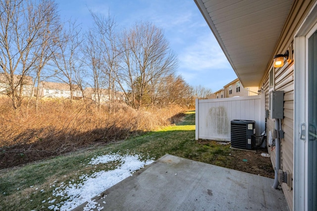 view of yard with a patio area and central AC