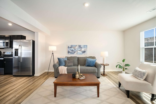 living room with light wood-type flooring