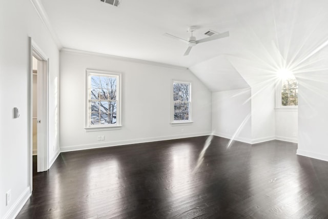 bonus room featuring ceiling fan, dark hardwood / wood-style floors, and lofted ceiling