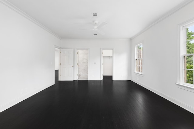 unfurnished room featuring dark wood-type flooring, ceiling fan, and crown molding