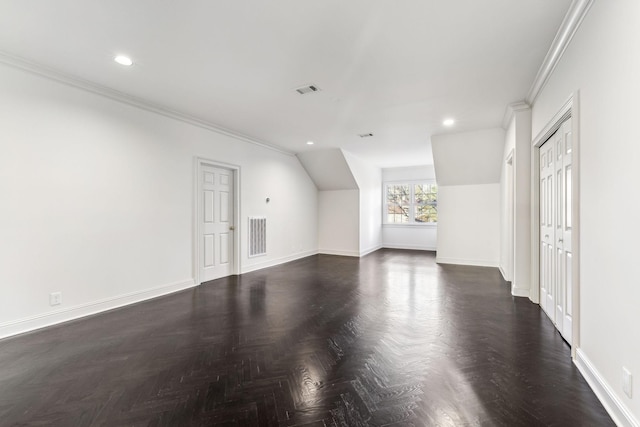 additional living space with dark parquet flooring