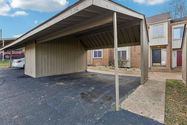 view of car parking featuring a carport