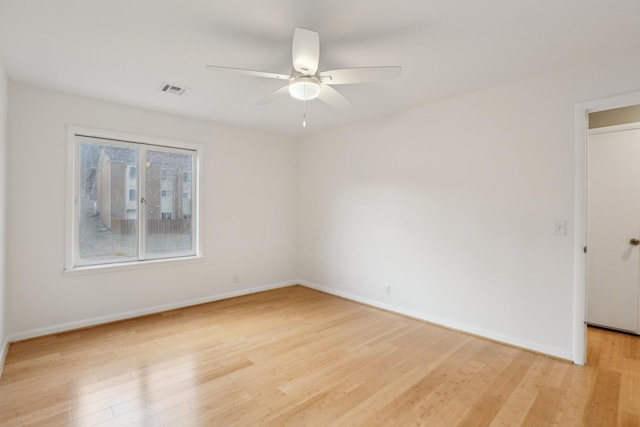 unfurnished room with ceiling fan and light hardwood / wood-style flooring