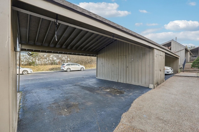 view of car parking featuring a carport