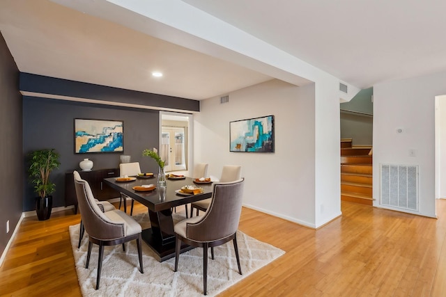 dining room featuring light wood-type flooring