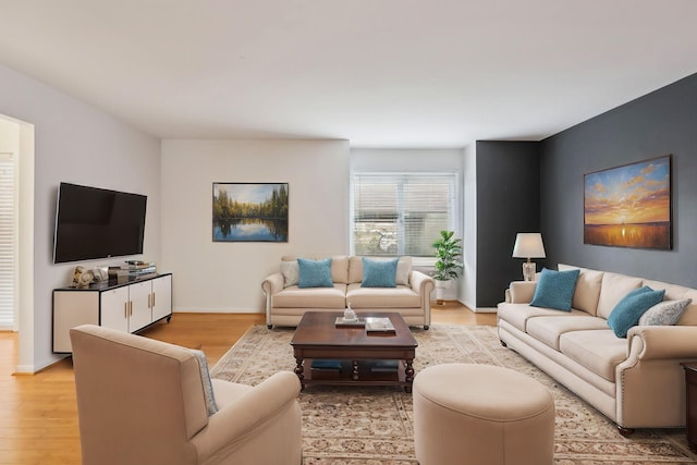 living room with light hardwood / wood-style floors