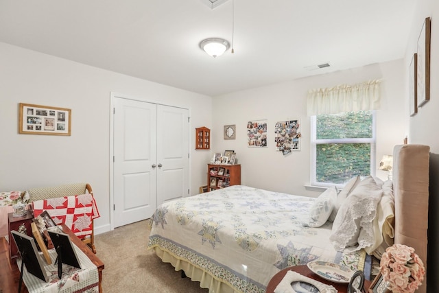 carpeted bedroom with a closet