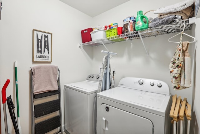 washroom with washer and clothes dryer