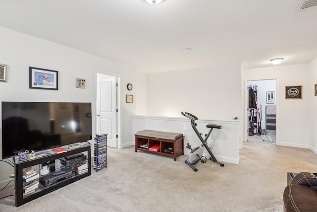 workout room with light carpet