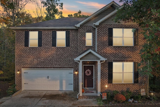 view of front of home with a garage