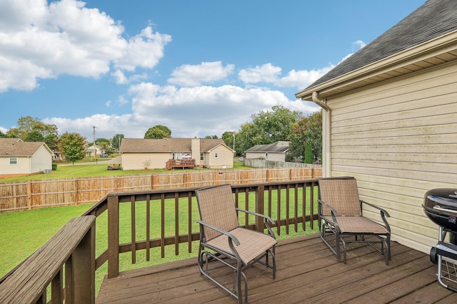 deck featuring a lawn